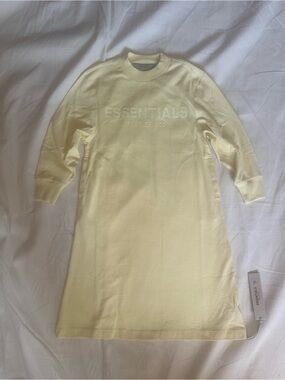 Essentials kids Long Sleeve Crewneck Dress in Pale Yellow